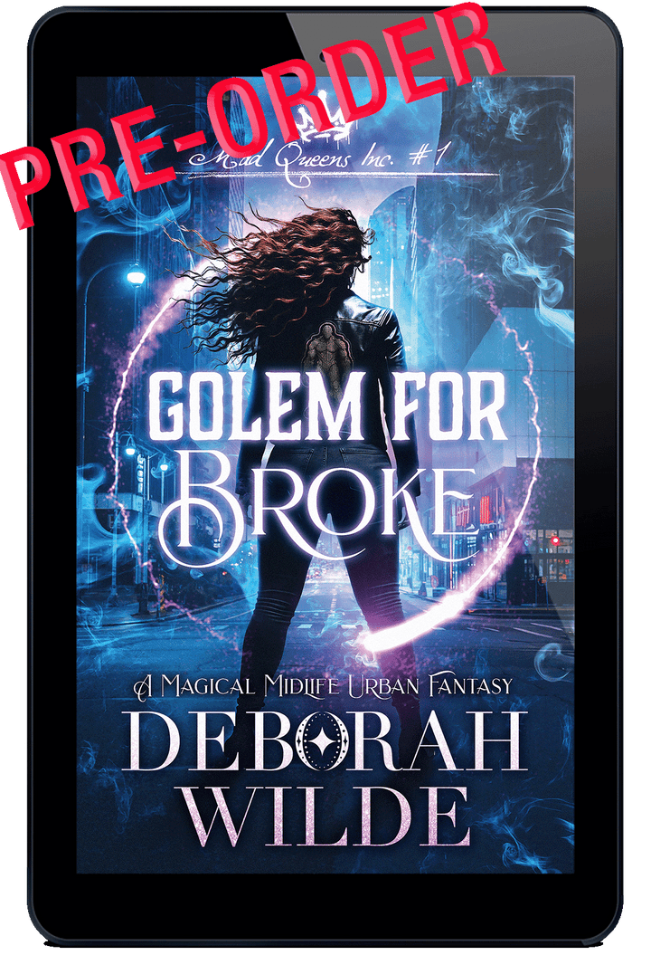 Pre-order book cover for "Golem for Broke" a woman with long wavy hair stands with her back to camera in a urban fantasy city street. A golem patch on her leather jacket. 