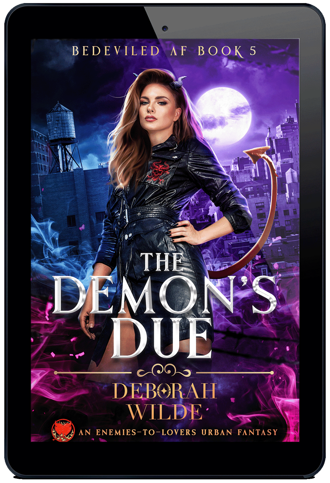 Ebook cover of "The Demon's Due" by Deborah Wilde. A woman with horns and a tail, wearing a leather jacket stands in front of a city at night.