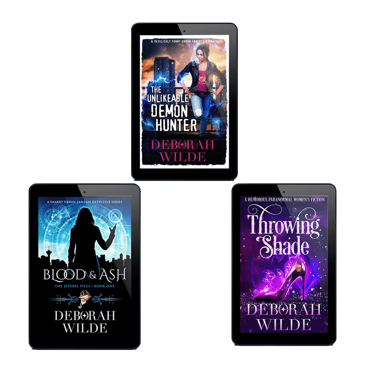 Three tablet screens displaying book covers by Deborah Wilde. Epic Badassery" includes books; "The Unlikeable Demon Hunter", "Blood & Ash", and "Throwing Shade".